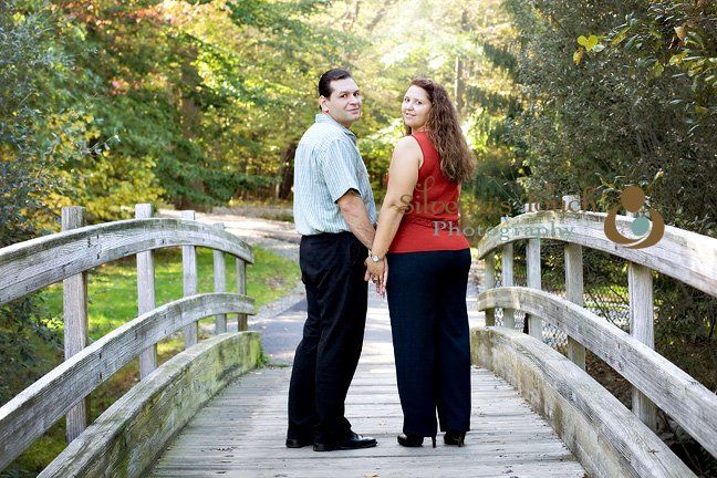 Dover NJ engagement portraits on a bridge at park