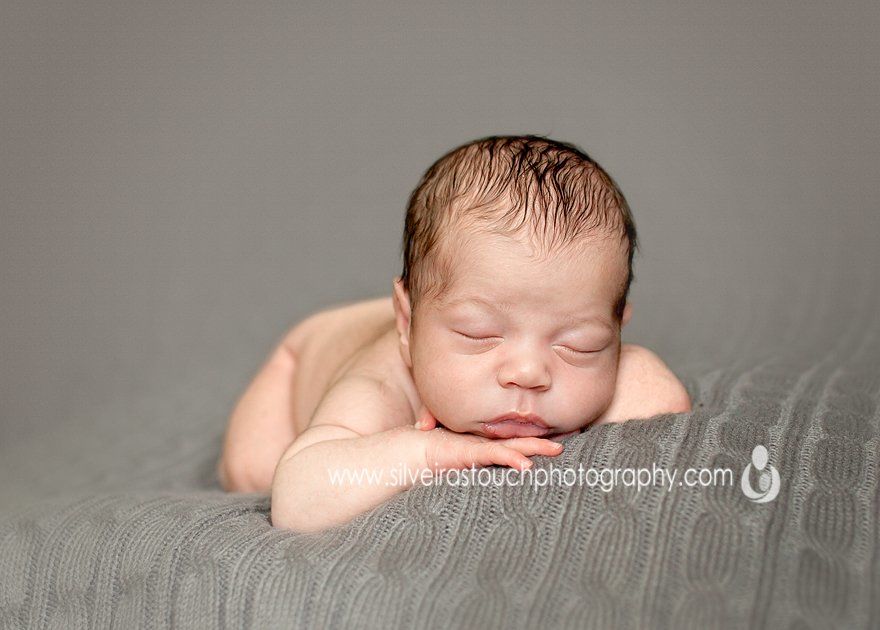 Sleeping newborn baby boy photography