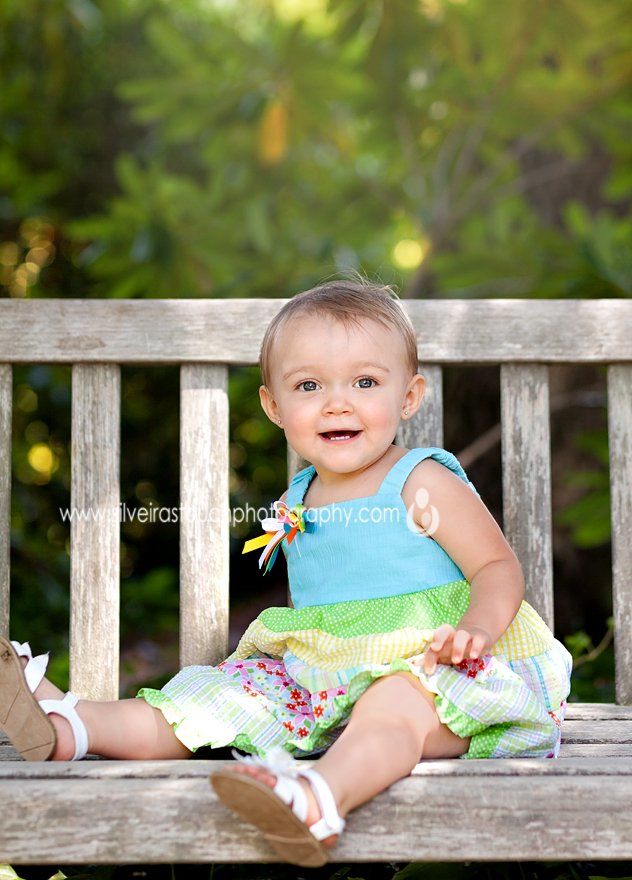 outdoor birthday photo of baby girl
