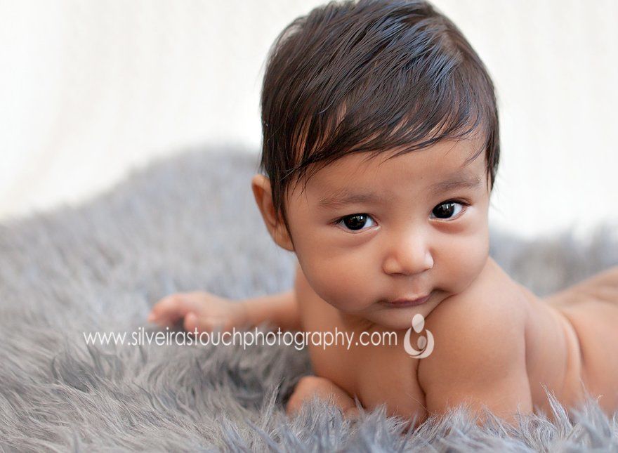 baby boy looking at camera