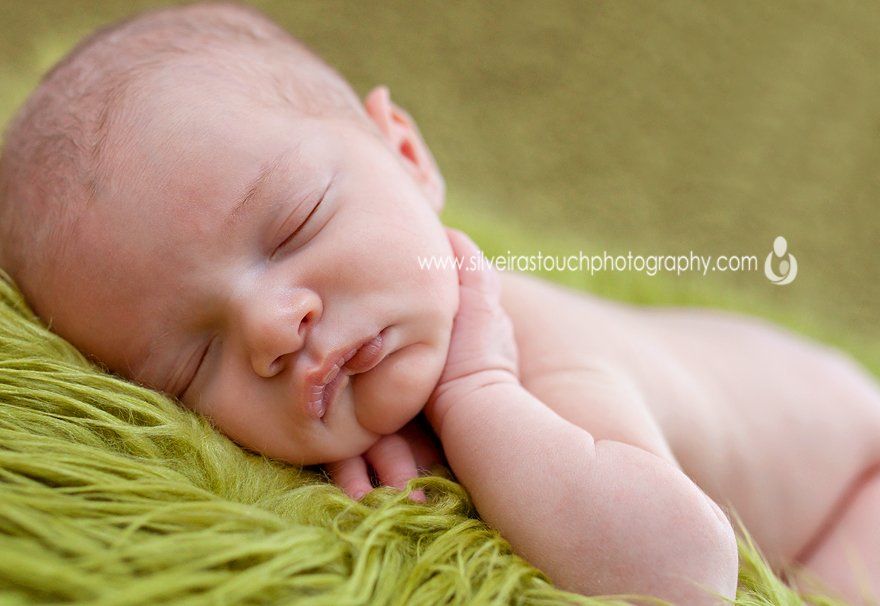 Newborn boy squishy face