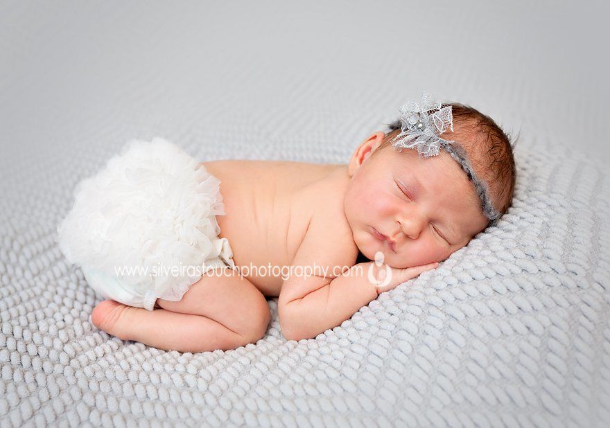 baby sleeping on blanket prop