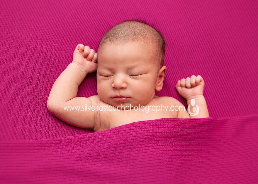 Newborn girl photography in pink