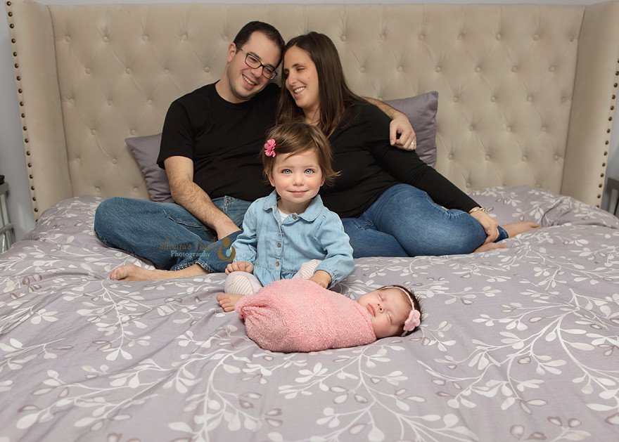 roseland NJ photographer capturing newborn family photos in home