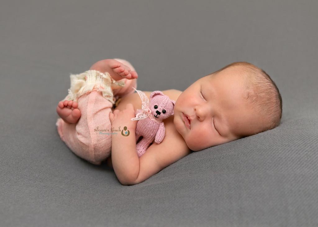 baby girl photoshoot in pink outfit