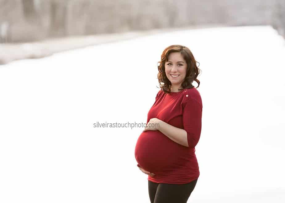 outdoor maternity photos in morris county nj taken on the snow