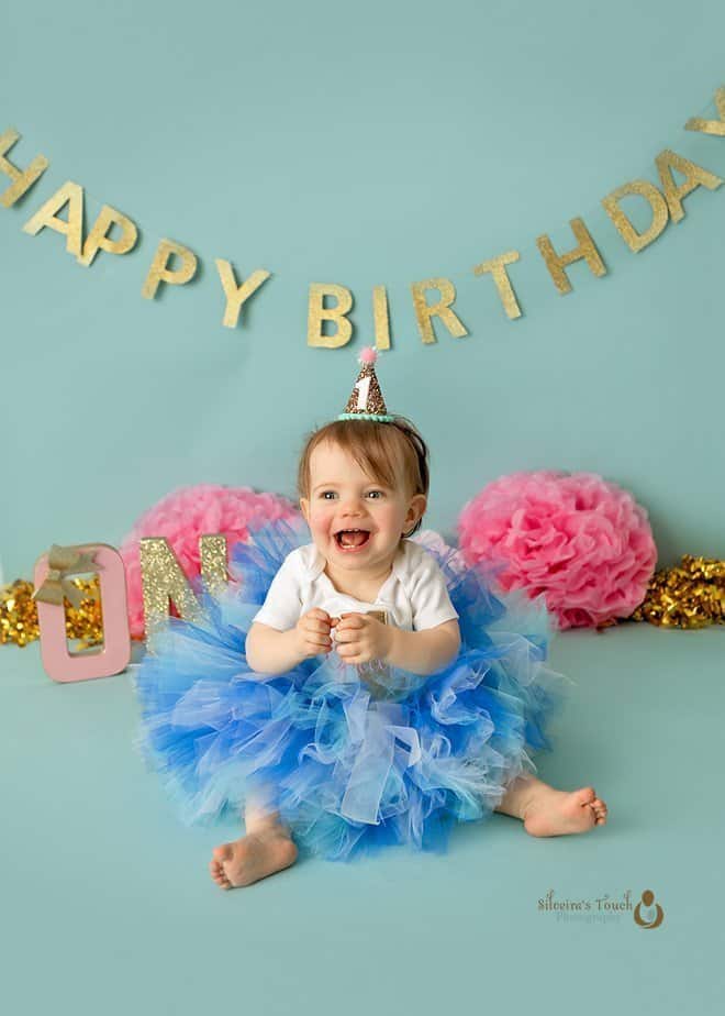 cake smash photography of beautiful baby girl