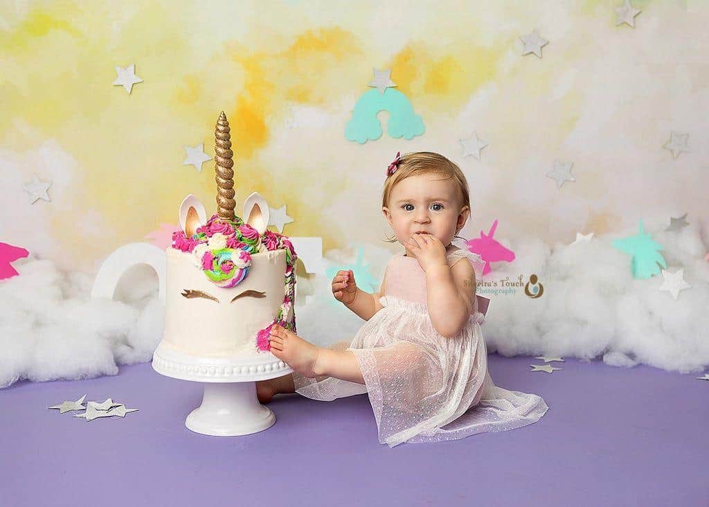 NJ baby photoshoot of birthday girl eating cake