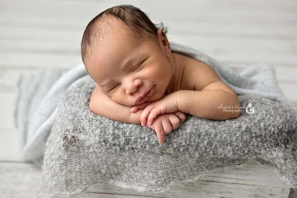 newborn photoshoot nj baby smiling