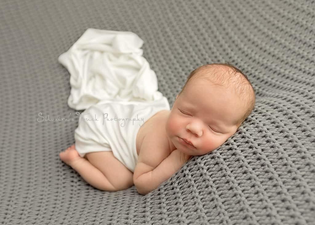 photo session of sleepy newborn