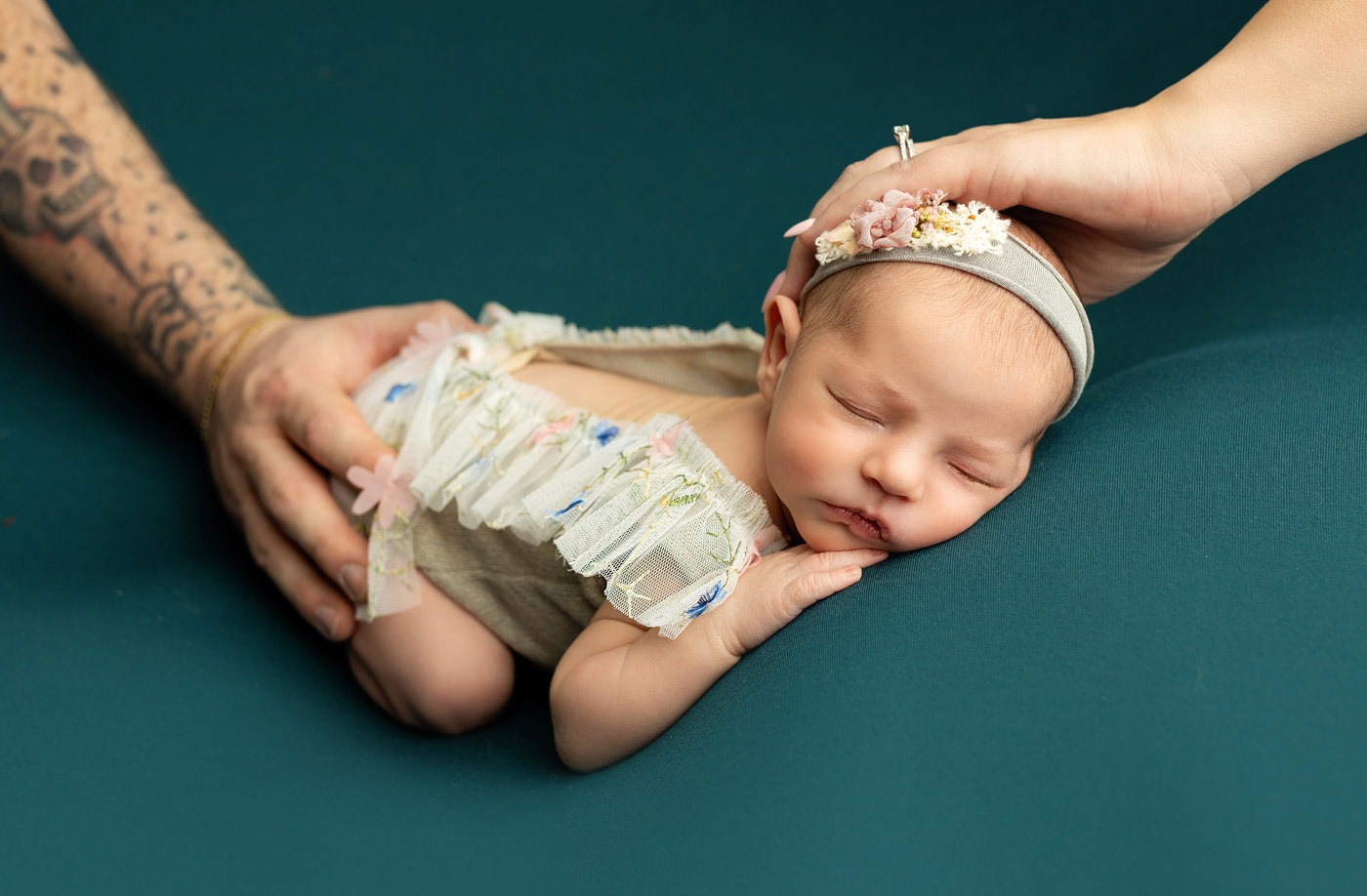 Parent hands on Baby picture NJ